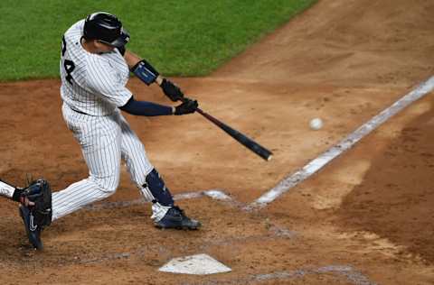 NEW YORK, NEW YORK - SEPTEMBER 17: Gary Sanchez #24 of the New York Yankees hits an RBI double during the fourth inning against the Toronto Blue Jays at Yankee Stadium on September 17, 2020 in the Bronx borough of New York City. (Photo by Sarah Stier/Getty Images)