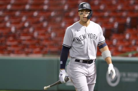 Aaron Judge #99 of the New York Yankees walks to the dugout after striking out during the tenth inning against the Boston Red Sox at Fenway Park on September 18, 2020 in Boston, Massachusetts. The Yankees defeat the Red Sox 6-5. (Photo by Maddie Meyer/Getty Images)