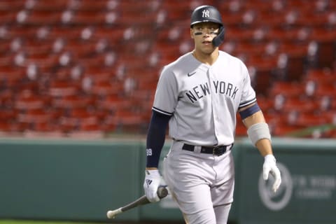 Aaron Judge #99 of the New York Yankees walks to the dugout after striking out during the tenth inning against the Boston Red Sox at Fenway Park on September 18, 2020 in Boston, Massachusetts. The Yankees defeat the Red Sox 6-5. (Photo by Maddie Meyer/Getty Images)