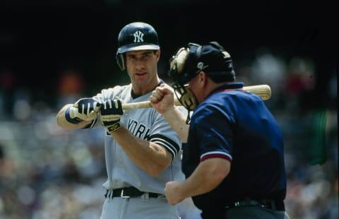 Umpire Dana DeMuth calls the third strike on Paul O’Neill of the New York Yankees during the game against the Detroit Tigers at Comerica Park on May 14, 2000 in Detroit, Michigan. (Photo by Tom Pidgeon/Getty Images)