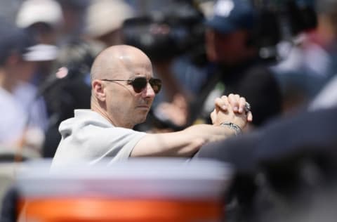 NEW YORK, NY - AUGUST 12: General Manager of the New York Yankees Brian Cashman is seen in the dugout prior to the game against the Texas Rangers at Yankee Stadium on August 12, 2018 in the Bronx borough of New York City. (Photo by Steven Ryan/Getty Images)