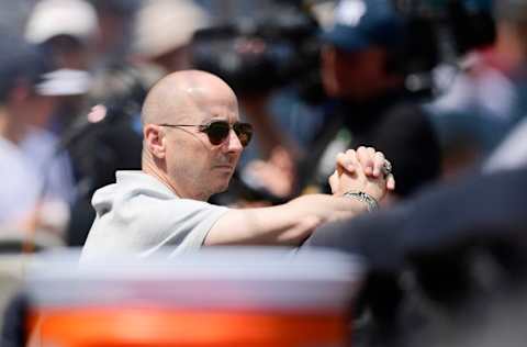 NEW YORK, NY - AUGUST 12: General Manager of the New York Yankees Brian Cashman is seen in the dugout prior to the game against the Texas Rangers at Yankee Stadium on August 12, 2018 in the Bronx borough of New York City. (Photo by Steven Ryan/Getty Images)