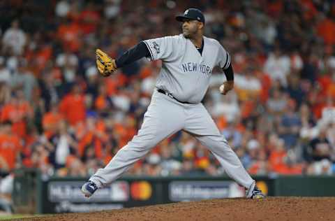 HOUSTON, TEXAS - OCTOBER 13: CC Sabathia #52 of the New York Yankees pitches against the Houston Astros during game two of the American League Championship Series at Minute Maid Park on October 13, 2019 in Houston, Texas. (Photo by Bob Levey/Getty Images)