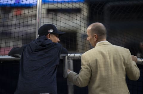 NEW YORK, NY - OCTOBER 03:Aaron Boone and Brian Cashman of the New York Yankees ahead of the American League Wildcard Game at Yankees Stadium on October 3, 2018 in the Bronx borough of New York City. (Photo by Benjamin Solomon/Getty Images)