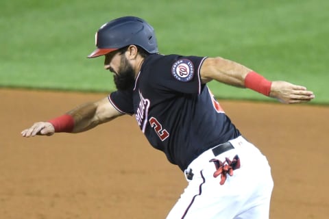 WASHINGTON, DC – SEPTEMBER 12: Adam Eaton #2 of the Washington Nationals runs to first base during a baseball game against the Atlanta Braves at Nationals Park on September 12, 2020 in Washington, DC. (Photo by Mitchell Layton/Getty Images)