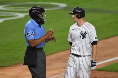 NEW YORK, NEW YORK - SEPTEMBER 17: DJ LeMahieu #26 of the New York Yankees looks at umpire CB Bucknor #54 after a call during the second inning against the Toronto Blue Jays at Yankee Stadium on September 17, 2020 in the Bronx borough of New York City. (Photo by Sarah Stier/Getty Images)