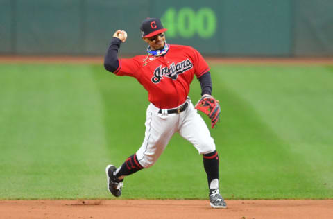 CLEVELAND, OHIO - SEPTEMBER 30: Shortstop Francisco Lindor #12 of the Cleveland Indians throws out DJ LeMahieu #26 of the New York Yankees during the first inning of Game Two of the American League Wild Card Series at Progressive Field on September 30, 2020 in Cleveland, Ohio. (Photo by Jason Miller/Getty Images)