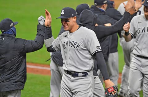 CLEVELAND, OHIO - SEPTEMBER 30: Aaron Judge #99 of the New York Yankees celebrates with a teammate after the Yankees defeated the Cleveland Indians in Game Two of the American League Wild Card Series at Progressive Field on September 30, 2020 in Cleveland, Ohio. The Yankees defeated the Indians 10-9. (Photo by Jason Miller/Getty Images)