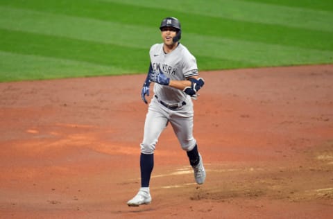 CLEVELAND, OHIO - SEPTEMBER 30: Giancarlo Stanton #27 of the New York Yankees rounds the bases on a solo homer during the second inning of Game Two of the American League Wild Card Series against the Cleveland Indians at Progressive Field on September 30, 2020 in Cleveland, Ohio. (Photo by Jason Miller/Getty Images)