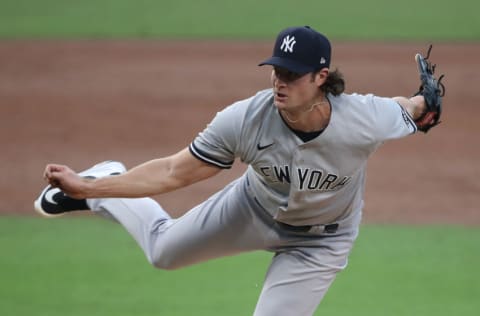 SAN DIEGO, CALIFORNIA - OCTOBER 05: Gerrit Cole #45 of the New York Yankees pitches against the Tampa Bay Rays during the third inning in Game One of the American League Division Series at PETCO Park on October 05, 2020 in San Diego, California. (Photo by Sean M. Haffey/Getty Images)