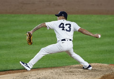 NEW YORK, NEW YORK – SEPTEMBER 25: (NEW YORK DAILIES OUT) Jonathan Loaisiga #43 of the New York Yankees in action against the Miami Marlins at Yankee Stadium on September 25, 2020 in New York City. The Marlins defeated the Yankees 4-3 in ten innings and clinched a playoff spot. (Photo by Jim McIsaac/Getty Images)