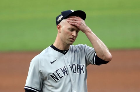 SAN DIEGO, CALIFORNIA - OCTOBER 06: J.A. Happ #33 of the New York Yankees reacts after allowing a two run home run to Mike Zunino (not pictured) of the Tampa Bay Rays during the second inning in Game Two of the American League Division Series at PETCO Park on October 06, 2020 in San Diego, California. (Photo by Sean M. Haffey/Getty Images)