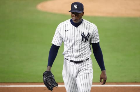 SAN DIEGO, CALIFORNIA - OCTOBER 08: Aroldis Chapman #54 of the New York Yankees walks off the field after retiring the side against the Tampa Bay Rays during the eighth inning in Game Four of the American League Division Series at PETCO Park on October 08, 2020 in San Diego, California. (Photo by Sean M. Haffey/Getty Images)