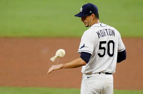 SAN DIEGO, CALIFORNIA - OCTOBER 17: Charlie Morton #50 of the Tampa Bay Rays reacts to walking Martin Maldonado #15 of the Houston Astros during the sixth inning in Game Seven of the American League Championship Series at PETCO Park on October 17, 2020 in San Diego, California. (Photo by Harry How/Getty Images)