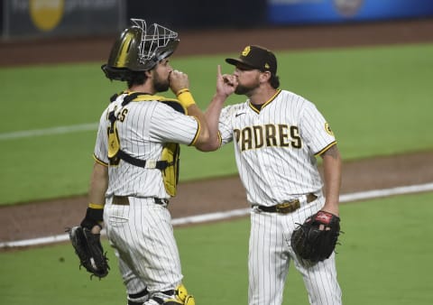 SAN DIEGO, CA – AUGUST 3: Kirby Yates #39 and Austin Hedges #18 of the San Diego Padres celebrate after defeating the Los Angeles Dodgers 5-4 at Petco Park August 3, 2020 in San Diego, California. (Photo by Denis Poroy/Getty Images)