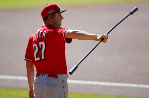 ATLANTA, GA - SEPTEMBER 30: Trevor Bauer #27 of the Cincinnati Reds warms up prior to Game One of the National League Wild Card Series between the Cincinnati Reds and Atlanta Braves at Truist Park on September 30, 2020 in Atlanta, Georgia. (Photo by Todd Kirkland/Getty Images)