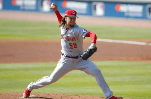 ATLANTA, GA - OCTOBER 01: Luis Castillo #58 of the Cincinnati Reds pitches in the first inning of Game Two of the National League Wild Card Series against the Atlanta Braves at Truist Park on October 1, 2020 in Atlanta, Georgia. (Photo by Todd Kirkland/Getty Images)