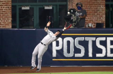 SAN DIEGO, CALIFORNIA - OCTOBER 06: Clint Frazier #77 of the New York Yankees catches a fly ball against the Tampa Bay Rays during the fourth inning in Game Two of the American League Division Series at PETCO Park on October 06, 2020 in San Diego, California. (Photo by Christian Petersen/Getty Images)