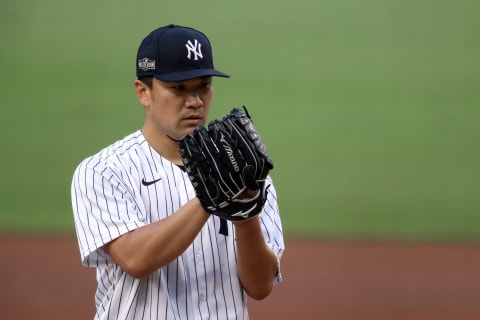 SAN DIEGO, CALIFORNIA – OCTOBER 07: Masahiro Tanaka #19 of the New York Yankees pitches against the Tampa Bay Rays during the fourth inning in Game Three of the American League Division Series at PETCO Park on October 07, 2020 in San Diego, California. (Photo by Christian Petersen/Getty Images)