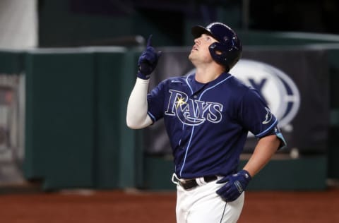 ARLINGTON, TEXAS - OCTOBER 24: Hunter Renfroe #11 of the Tampa Bay Rays celebrates after hitting a solo home run against the Los Angeles Dodgers during the fifth inning in Game Four of the 2020 MLB World Series at Globe Life Field on October 24, 2020 in Arlington, Texas. (Photo by Tom Pennington/Getty Images)