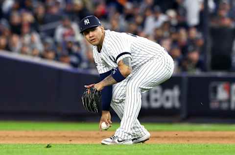 NEW YORK, NEW YORK - OCTOBER 17: Gleyber Torres #25 of the New York Yankees reacts after committing an error against the Houston Astros during the eighth inning in game four of the American League Championship Series at Yankee Stadium on October 17, 2019 in New York City. (Photo by Mike Stobe/Getty Images)