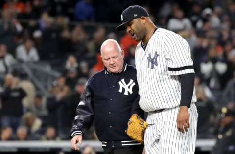 NEW YORK, NEW YORK - OCTOBER 17: CC Sabathia #52 of the New York Yankees walks off the field as he comes out of the game against the Houston Astros during the eighth inning in game four of the American League Championship Series at Yankee Stadium on October 17, 2019 in New York City. (Photo by Elsa/Getty Images)