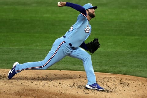 ARLINGTON, TEXAS – SEPTEMBER 27: Jordan Lyles #24 of the Texas Rangers throws against the Houston Astros in the second inning at Globe Life Field on September 27, 2020 in Arlington, Texas. (Photo by Ronald Martinez/Getty Images)