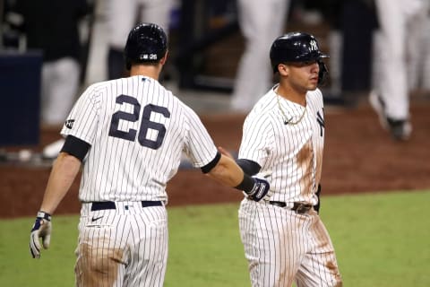 DJ LeMahieu #26 and Gleyber Torres #25 of the New York Yankees (Photo by Christian Petersen/Getty Images)