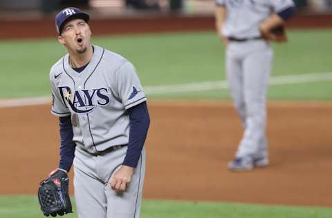 ARLINGTON, TEXAS - OCTOBER 27: Blake Snell #4 of the Tampa Bay Rays reacts as he is being taken out of the game against the Los Angeles Dodgers during the sixth inning in Game Six of the 2020 MLB World Series at Globe Life Field on October 27, 2020 in Arlington, Texas. (Photo by Tom Pennington/Getty Images)