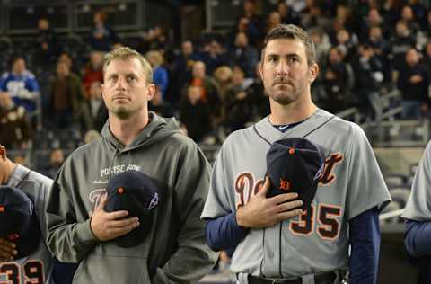 NEW YORK, NY - OCTOBER 13: Max Scherzer #37 and Justin Verlander #35 of the Detroit Tigers look on during the National Anthem prior to Game One of the American League Championship Series against the New York Yankees at Yankee Stadium on October 13, 2012 in the Bronx borough of New York City, New York. The Tigers defeated the Yankees 6-4 in 12 innings. (Photo by Mark Cunningham/MLB Photos via Getty Images)