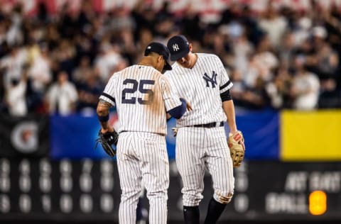 NEW YORK - MAY 31: Gleyber Torres #25 and DJ LeMahieu #26 of the New York Yankees high five after the game against the Boston Red Sox at Yankee Stadium on May 31, 2019 in the Bronx borough of New York City. (Photo by Rob Tringali/SportsChrome/Getty Images)