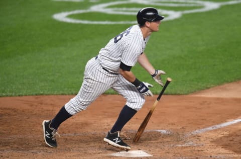 NEW YORK, NEW YORK - SEPTEMBER 25: DJ LeMahieu #26 of the New York Yankees drops his bat heading to first during the fifth inning against the Miami Marlins at Yankee Stadium on September 25, 2020 in the Bronx borough of New York City. (Photo by Sarah Stier/Getty Images)