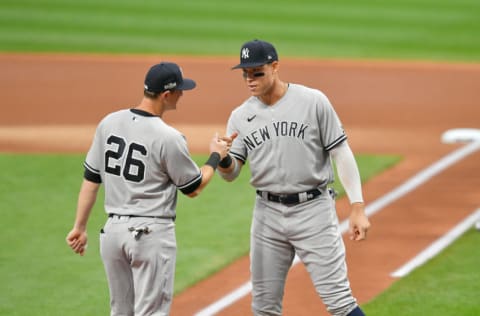 CLEVELAND, OHIO - SEPTEMBER 29: DJ LeMahieu #26 celebrates with Aaron Judge #99 of the New York Yankees during during player introductions prior to Game One of the American League Wild Card Series against the Cleveland Indians at Progressive Field on September 29, 2020 in Cleveland, Ohio. (Photo by Jason Miller/Getty Images)