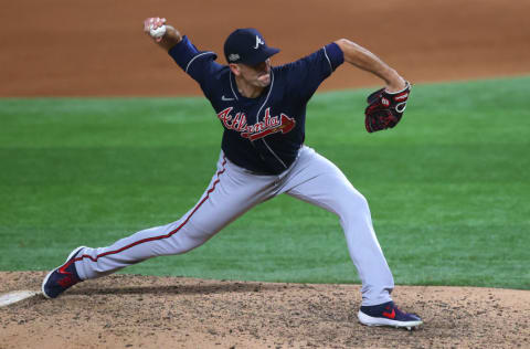 ARLINGTON, TEXAS - OCTOBER 13: Darren O'Day #56 of the Atlanta Braves delivers the pitch against the Los Angeles Dodgers during the seventh inning in Game Two of the National League Championship Series at Globe Life Field on October 13, 2020 in Arlington, Texas. (Photo by Ronald Martinez/Getty Images)