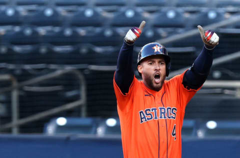 SAN DIEGO, CALIFORNIA - OCTOBER 16: George Springer #4 of the Houston Astros celebrates a two run single against the Tampa Bay Rays during the fifth inning in Game Six of the American League Championship Series at PETCO Park on October 16, 2020 in San Diego, California. (Photo by Ezra Shaw/Getty Images)