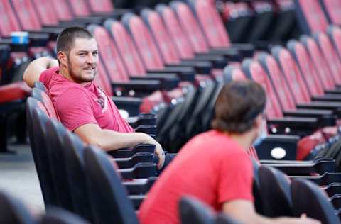 CINCINNATI, OH - JULY 18: Cincinnati Reds pitcher Trevor Bauer talks to a teammate while looking on during a team scrimmage at Great American Ball Park on July 18, 2020 in Cincinnati, Ohio. (Photo by Joe Robbins/Getty Images)