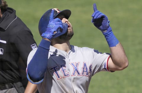 SAN FRANCISCO, CALIFORNIA - AUGUST 02: Joey Gallo #13 of the Texas Rangers celebrates after he hit a three-run home run against the San Francisco Giants in the top of the seventh inning at Oracle Park on August 02, 2020 in San Francisco, California. (Photo by Thearon W. Henderson/Getty Images)