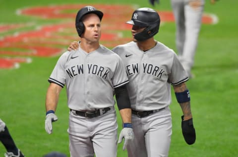 CLEVELAND, OHIO - SEPTEMBER 29: Brett Gardner #11 and Gleyber Torres #25 of the New York Yankees celebrate after both scored on a homer by Gardner during the seventh inning against the Cleveland Indians during Game One of the American League Wild Card Series at Progressive Field on September 29, 2020 in Cleveland, Ohio. The Yankees defeated the Indians 12-3. (Photo by Jason Miller/Getty Images)