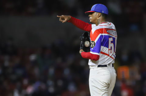 MAZATLAN, MEXICO - FEBRUARY 05: Luis Medina starting pitcher of Los Criollos de Caguas makes a sign to the umpire (not in frame) in the second inning during a match between Puerto Rico and Mexico as part of Serie del Caribe 2021 at Teodoro Mariscal Stadium on February 5, 2021 in Mazatlan, Mexico. (Photo by Norte Photo/Getty Images)