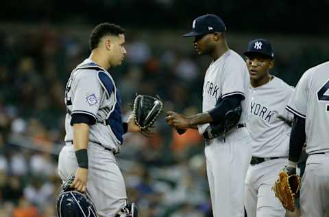 DETROIT, MI - JUNE 4: Catcher Gary Sanchez #24 of the New York Yankees visits pitcher Domingo German #65 of the New York Yankees during game two of a doubleheader at Comerica Park on June 4, 2018 in Detroit, Michigan. Players on both teams are wearing the number 42 to celebrate Jackie Robinson Day, as it is the makeup of the game rained out on April 15. (Photo by Duane Burleson/Getty Images)