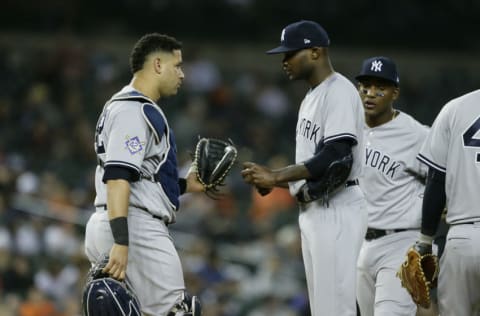 DETROIT, MI - JUNE 4: Catcher Gary Sanchez #24 of the New York Yankees visits pitcher Domingo German #65 of the New York Yankees during game two of a doubleheader at Comerica Park on June 4, 2018 in Detroit, Michigan. Players on both teams are wearing the number 42 to celebrate Jackie Robinson Day, as it is the makeup of the game rained out on April 15. (Photo by Duane Burleson/Getty Images)