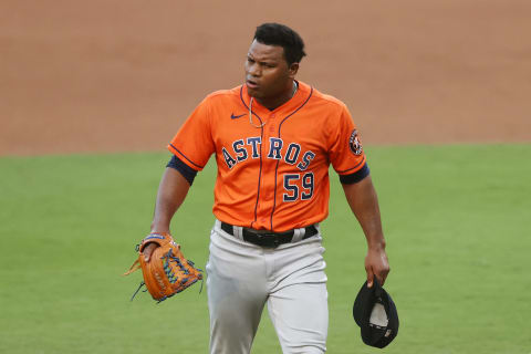 SAN DIEGO, CALIFORNIA – OCTOBER 16: Framber Valdez #59 of the Houston Astros reacts to Yandy Diaz #2 of the Tampa Bay Rays yelling during the sixth inning in Game Six of the American League Championship Series at PETCO Park on October 16, 2020 in San Diego, California. (Photo by Ezra Shaw/Getty Images)