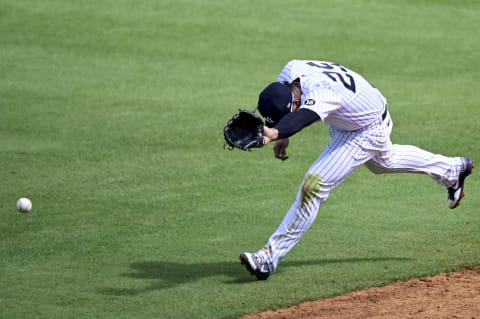 TAMPA, FLORIDA – FEBRUARY 28: Gleyber Torres #25 of the New York Yankees attempts to field a line drive during the third inning against the Toronto Blue Jays during a spring training game at George M. Steinbrenner Field on February 28, 2021 in Tampa, Florida. (Photo by Douglas P. DeFelice/Getty Images)