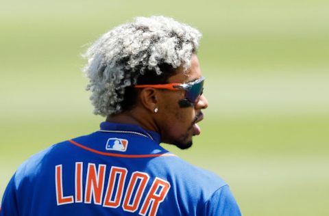 JUPITER, FLORIDA - MARCH 17: Francisco Lindor #12 of the New York Mets looks on against the Miami Marlins during the fourth inning of a Grapefruit League spring training game at Roger Dean Stadium on March 17, 2021 in Jupiter, Florida. (Photo by Michael Reaves/Getty Images)