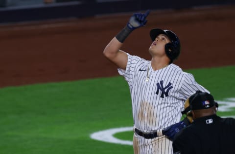 NEW YORK, NY - APRIL 20: Gio Urshela #29 of the New York Yankees gestures after he hit a home run against the Atlanta Braves during the fifth inning of an MLB baseball game at Yankee Stadium on April 20, 2021 in New York City. (Photo by Rich Schultz/Getty Images)