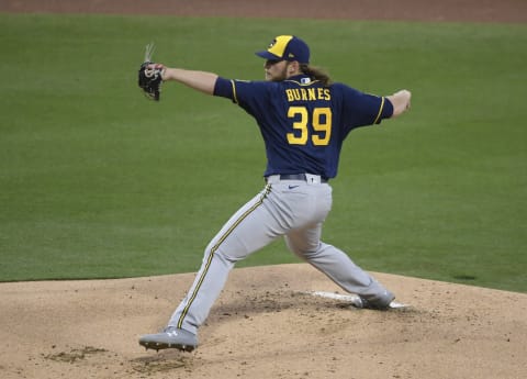 SAN DIEGO, CA – APRIL 20: Corbin Burnes #39 of the Milwaukee Brewers pitches during the first inning of a baseball game against the San Diego Padres at Petco Park on April 20, 2021 in San Diego, California. (Photo by Denis Poroy/Getty Images)