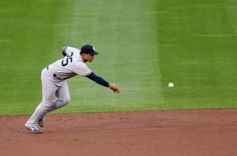 BUFFALO, NEW YORK - SEPTEMBER 08: Gleyber Torres #25 of the New York Yankees looks to turn a double play on a ball hit by Rowdy Tellez #44 of the Toronto Blue Jays during the first inning at Sahlen Field on September 08, 2020 in Buffalo, New York. The Blue Jays are the home team and are playing their home games in Buffalo due to the Canadian government’s policy on coronavirus (COVID-19). (Photo by Bryan M. Bennett/Getty Images)