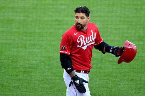 CINCINNATI, OHIO - APRIL 03: Nick Castellanos #2 of the Cincinnati Reds looks on after a run in the third inning against the St. Louis Cardinals at Great American Ball Park on April 03, 2021 in Cincinnati, Ohio. (Photo by Emilee Chinn/Getty Images)