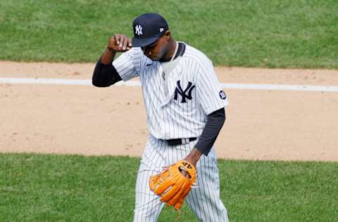 NEW YORK, NEW YORK - APRIL 04: Domingo German #55 of the New York Yankees heads to the dugout at the end of the second inning against the Toronto Blue Jays at Yankee Stadium on April 04, 2021 in the Bronx borough of New York City. (Photo by Sarah Stier/Getty Images)