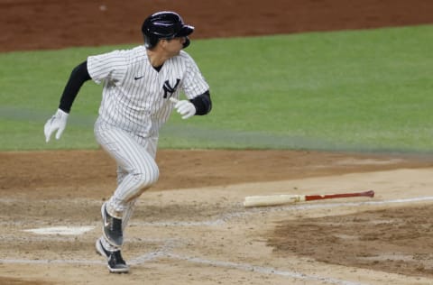 NEW YORK, NEW YORK - APRIL 06: Kyle Higashioka #66 of the New York Yankees hits a double during the eighth inning against the Baltimore Orioles at Yankee Stadium on April 06, 2021 in the Bronx borough of New York City. The Yankees won 7-2. (Photo by Sarah Stier/Getty Images)